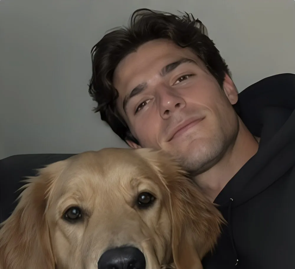 Terra Chad with his golden retriever