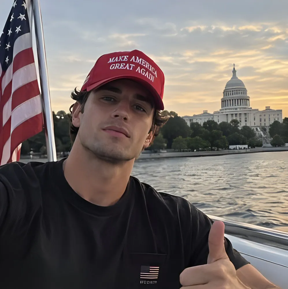 Terra Chad as Grant, red MAGA cap, the Capitol behind him